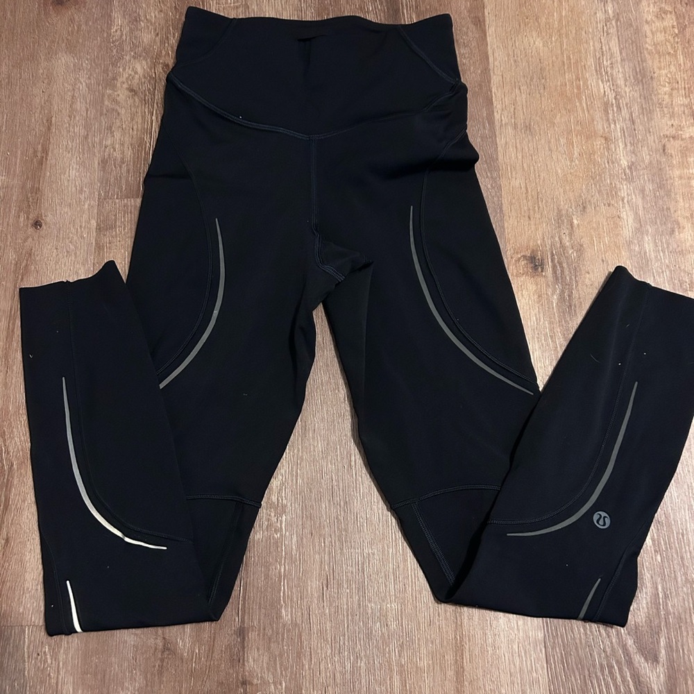 Lululemon Athletica Black Leggings with reflective design. Made for running.